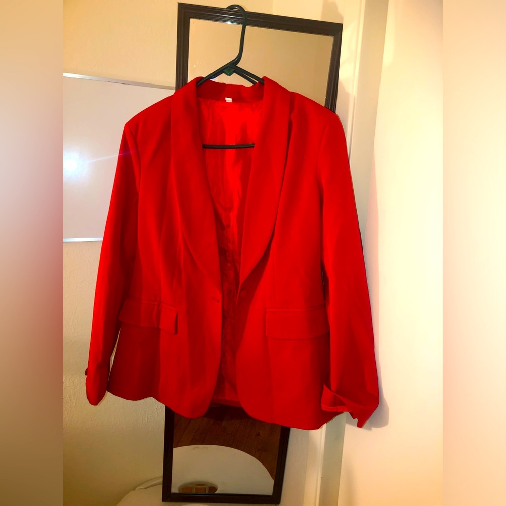 Red Blazer size M , 19 inches PTP, 27 inches long 100% polyester